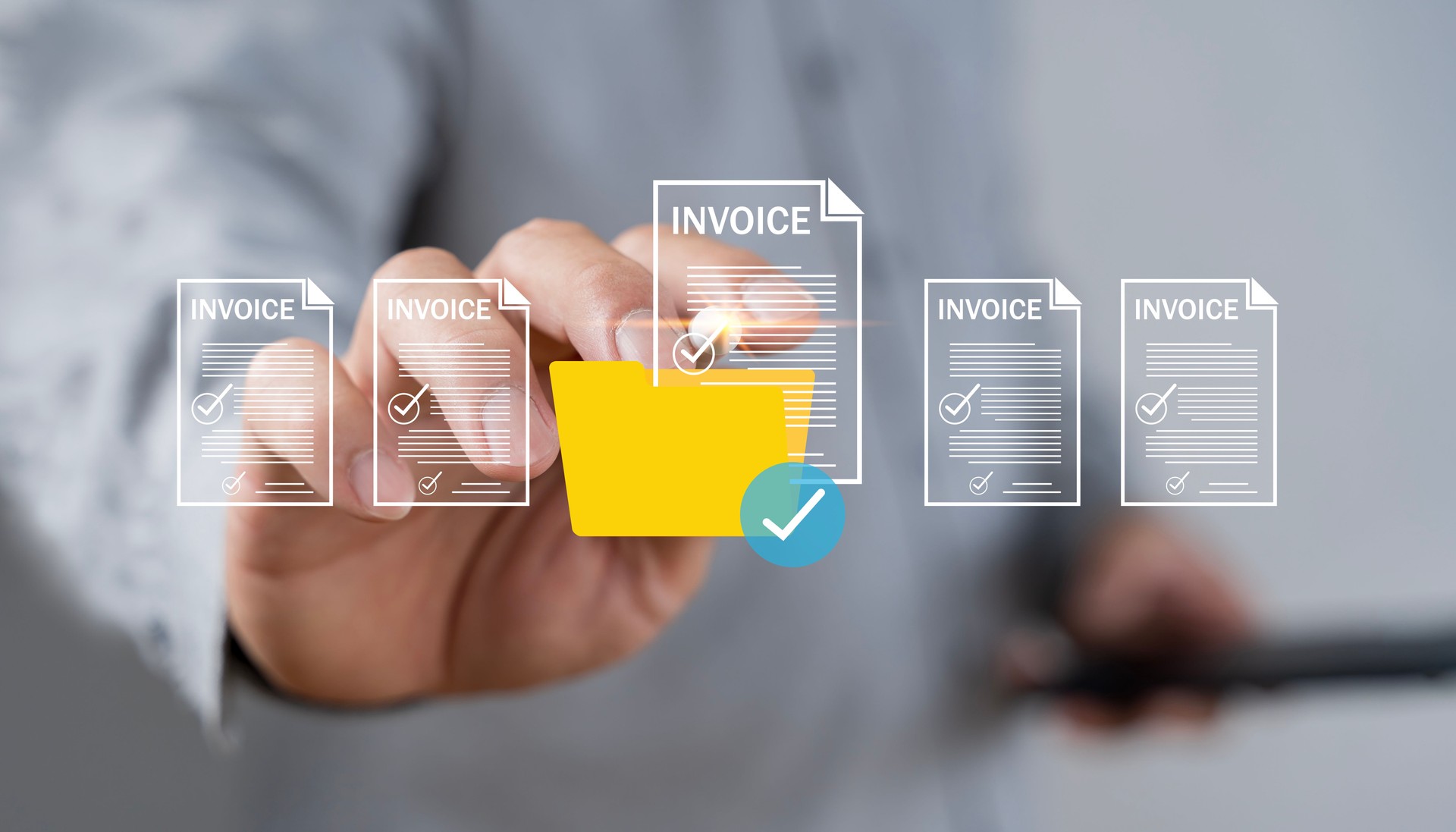 E-invoice and online digital statements concept. Businessman using computer laptop with invoice icons on virtual screen.